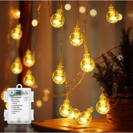 Aigostar - Corrente exterior de Natal LED 100xLED/3xAA/8 funções 10,3 m IP44 branco quente