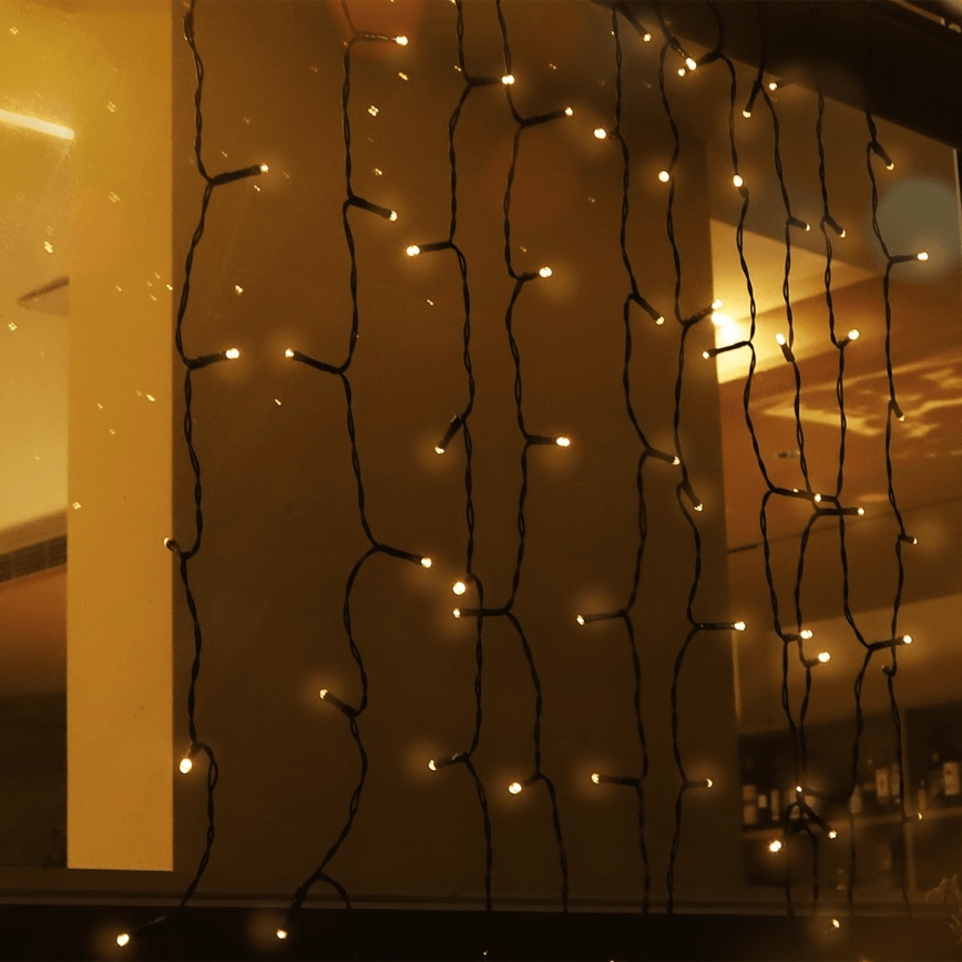 Aigostar - LED Solar Corrente de Natal 100xLED/8 funções 4x1m IP65 branco quente