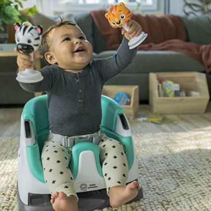 Almofada de cadeira de refeição com 2 brinquedos 2em1 DINE&DISCOVER