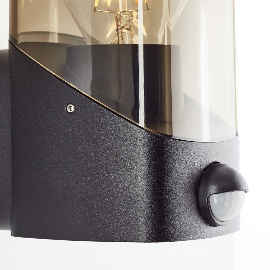 Brilliant - Iluminação de parede exterior com sensor MINOU 1xE27/10W/230V IP44 preto/fumado