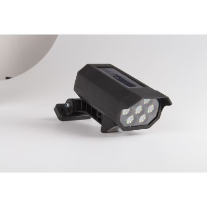 Câmara de segurança fictícia LED com sensor e painel solar LED/5W/5,5V IP65 + controlo remoto