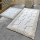 CONJUNTO 2x Tapetes para casa de banho STONE 60/100 cm branco