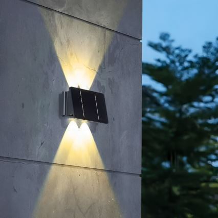 Iluminação de parede solar LED 4xLED/1,5W/3,7V IP54 preto