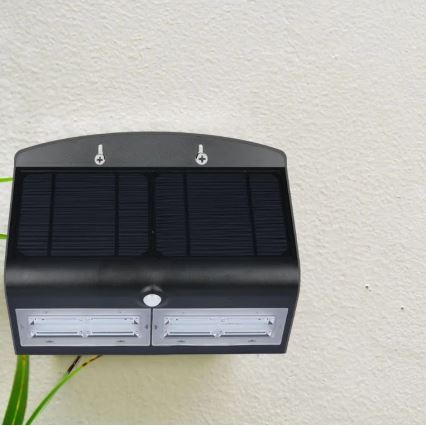 Iluminação de parede solar LED com sensor LED/7W/3,7V 4000K IP65 preta