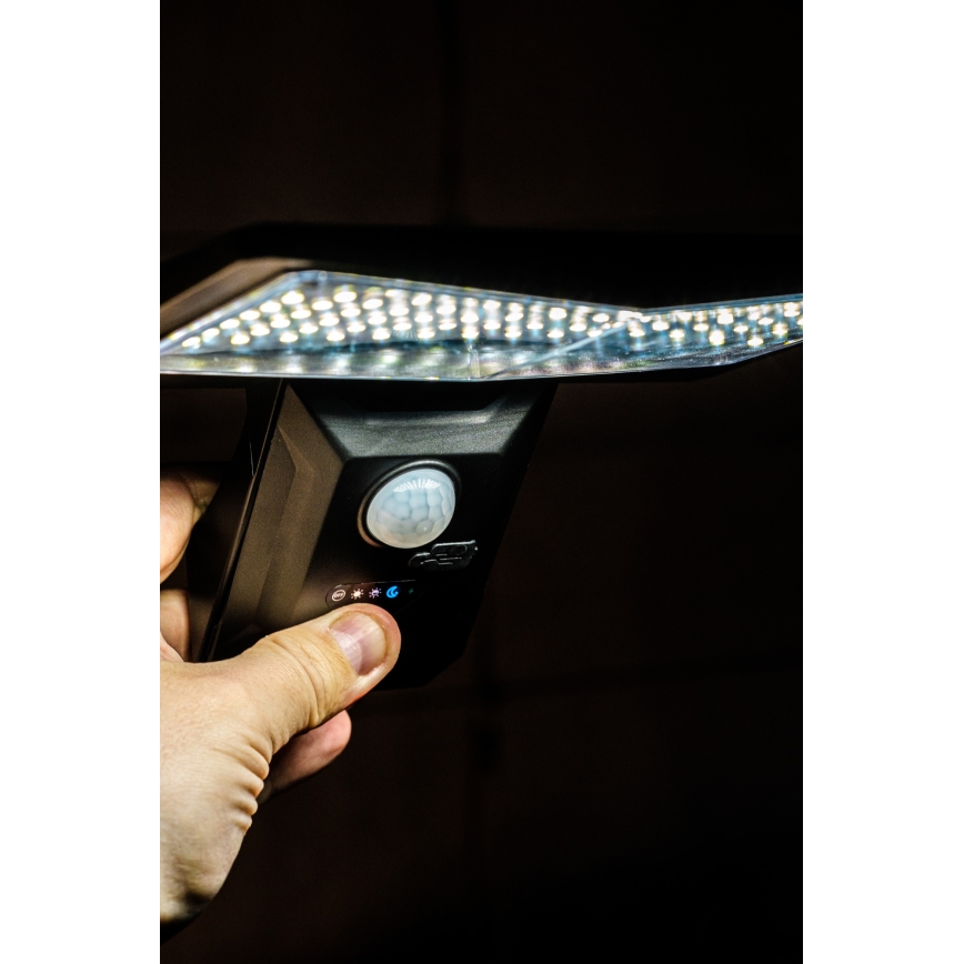 Iluminação solar de parede LED com sensor LED/2,6W/5,5V IP65 1800 mAh preto