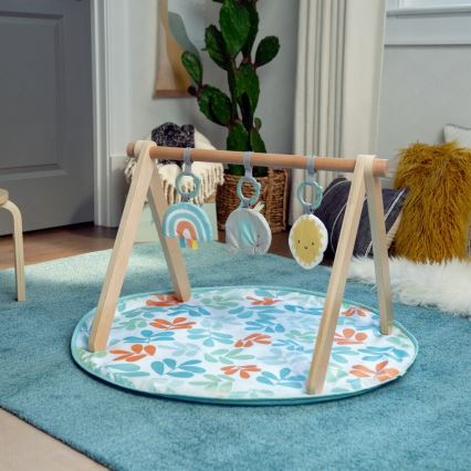 Ingenuity - Cobertor infantil para brincar com um trapézio de madeira SOL VALLEY