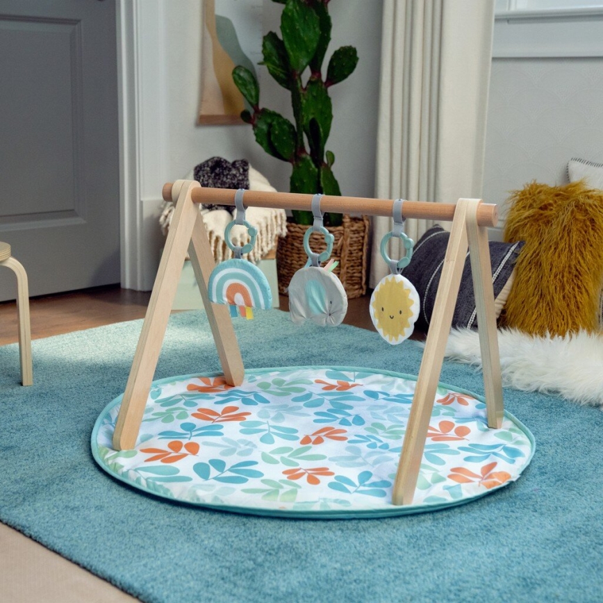 Ingenuity - Cobertor infantil para brincar com um trapézio de madeira SOL VALLEY