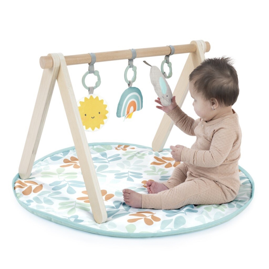 Ingenuity - Cobertor infantil para brincar com um trapézio de madeira SOL VALLEY