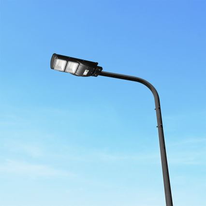 Luminária solar de rua LED regulável com sensor de movimento e crepúsculo LED/8W/3,2V 6000K IP65 9000 mAh preta + controlo remoto