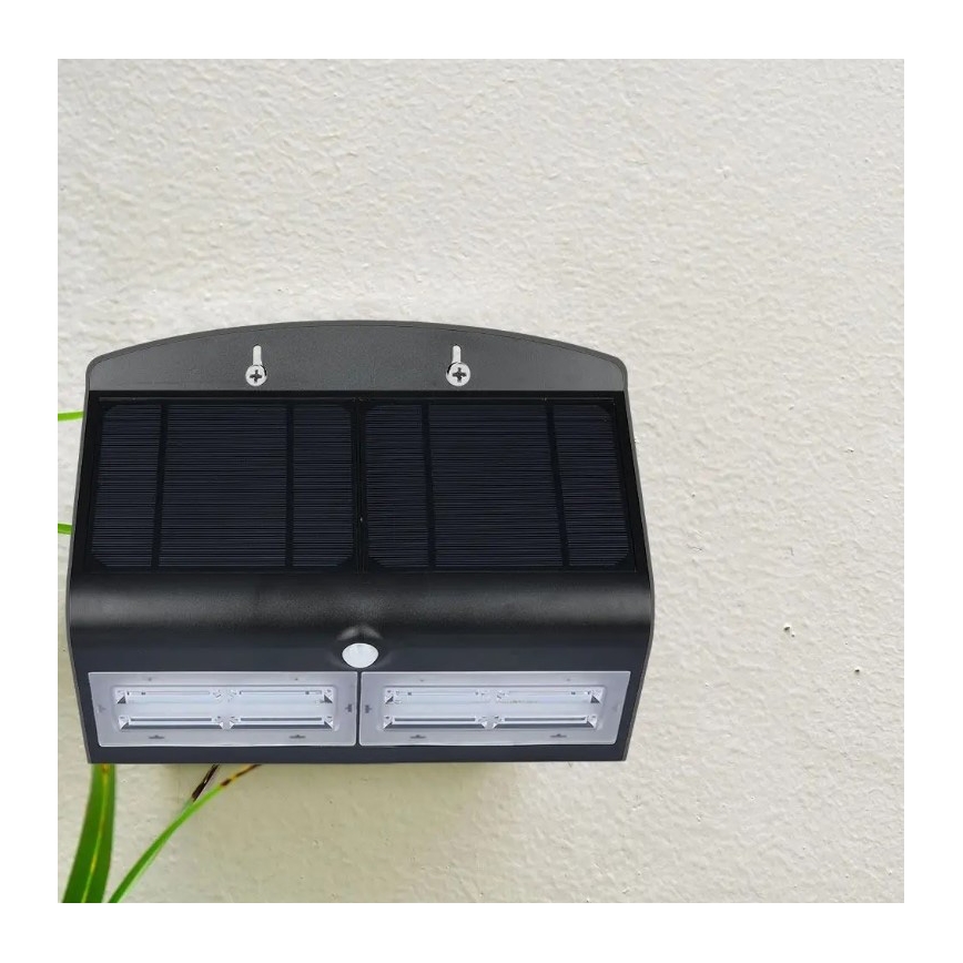 Luminária de parede solar LED com sensor LED/7W/3,7V 4000K IP65 4000 mAh preta