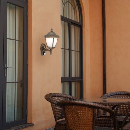 Rabalux - Luz de parede de exterior com sensor 1xE27/60W/230V IP43 dourado