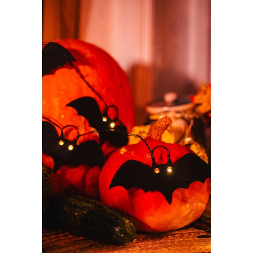 Corrente decorativa LED HALLOWEEN 10xLED/2xAA/branco quente 1,3m morcegos