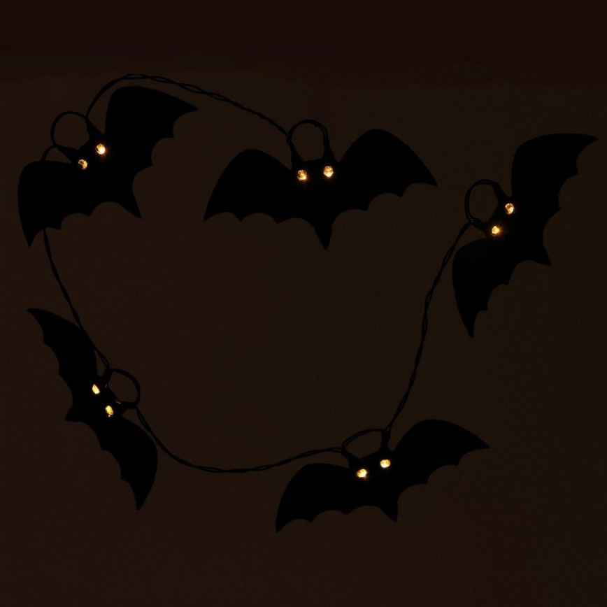 Corrente decorativa LED HALLOWEEN 10xLED/2xAA/branco quente 1,3m morcegos