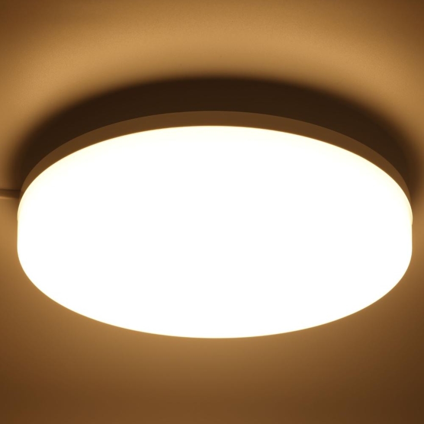 Iluminação de teto LED RGBW para casa de banho com regulação LED/20W/230V Wi-Fi IP44 branco