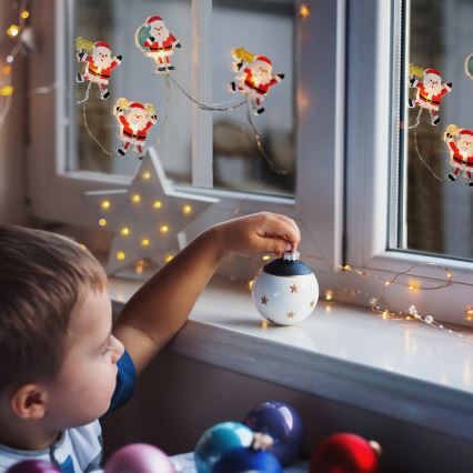 Corrente de Natal LED com chávenas de sucção 6xLED/2xAA 1,2m branco quente Pai Natal